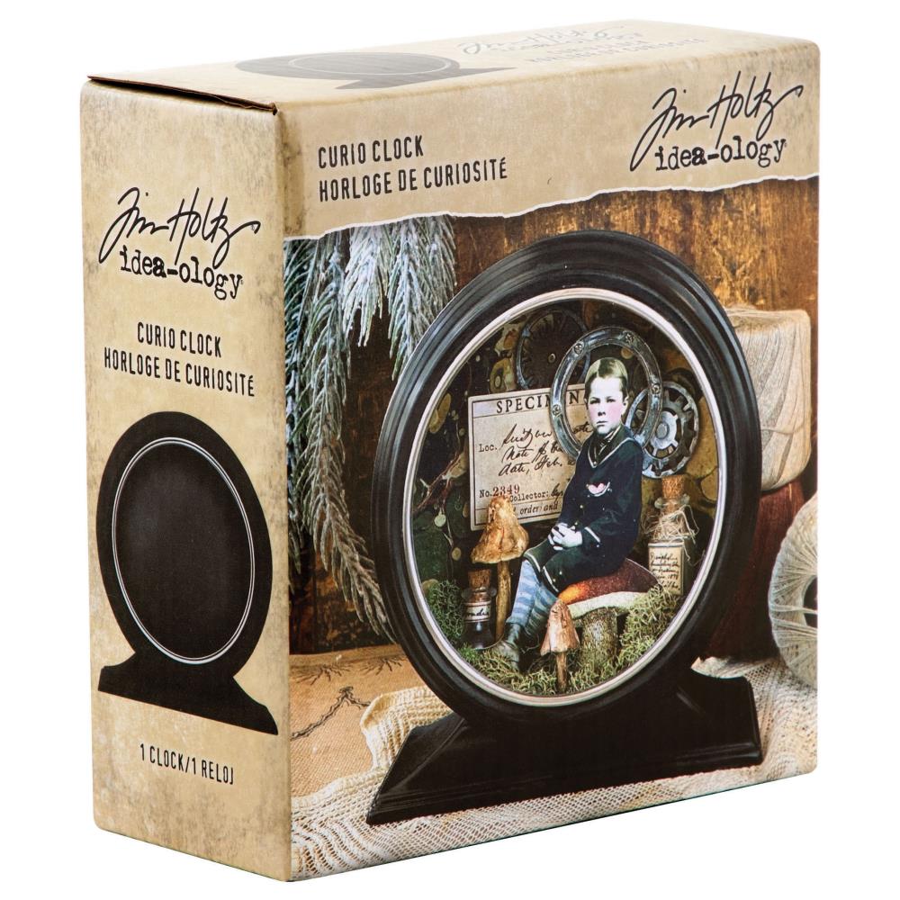 Curio Clock Frame, Matte Black ... by Tim Holtz Idea-Ology - Use for mixed media, assemblage projects, off-the-page marvels and party decor. Pack of 1 (one) metal round frame with rectangle base (an empty clock frame) with silver surround. 