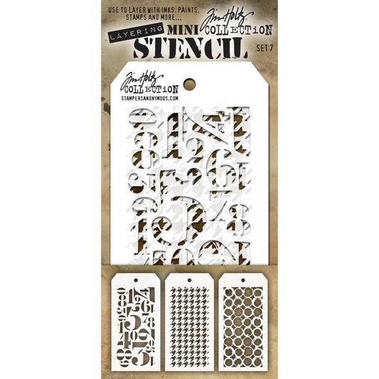 Set 7 - Mini Layering Stencils by Tim Holtz ... 3 (three) designs - Numeric, Houndstooth, Rings. One of each, approx 8cm x 16cm in size. (MST007) by Stampers Anonymous.   A versatile set of three small stencils (8cm x 16cm tag) featuring jumbled numbers large and small, in a serif font (Numeric), vintage fabric pattern over the whole area (Houndstooth), rustic inky circles joined together in rows to cover the whole area of the stencil (Rings).