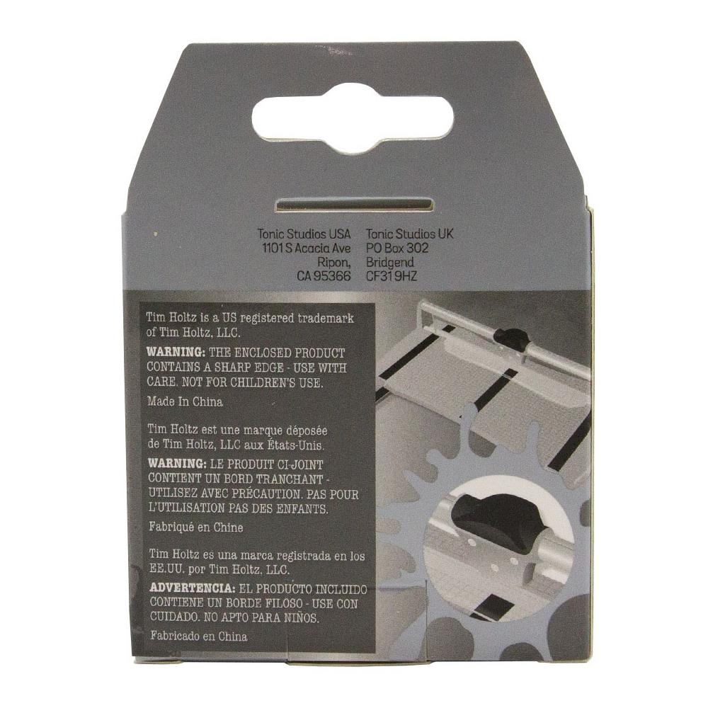 Box for the Replacement Blade with Carriage (for the Tim Holtz Rotary Media Trimmer) - by Tim Holtz and Tonic Studio ... a spare blade for a professional trimmer designed with makers in mind for all kinds of papercraft creativity. Pack contains 1 (one) Rotary Blade Carriage, 1 (one) Allen key and instructions.