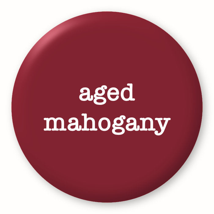 Aged Mahogany - Tim Holtz Distress by Ranger - Image of a round spot with the colour name in the centre. To coincide with your choice of colour when purchasing Distress Paint, Spray Stain, Oxide Spray, Ink Pad, Oxide Ink Pad, Reinker, Oxide Reinker, Embossing Glaze, or Archival Reinker from Art by Jenny Online Shop in Australia. Please note, while we have taken care to show a close representation, the colour may vary between screens or different mediums (inks, oxides, etc).