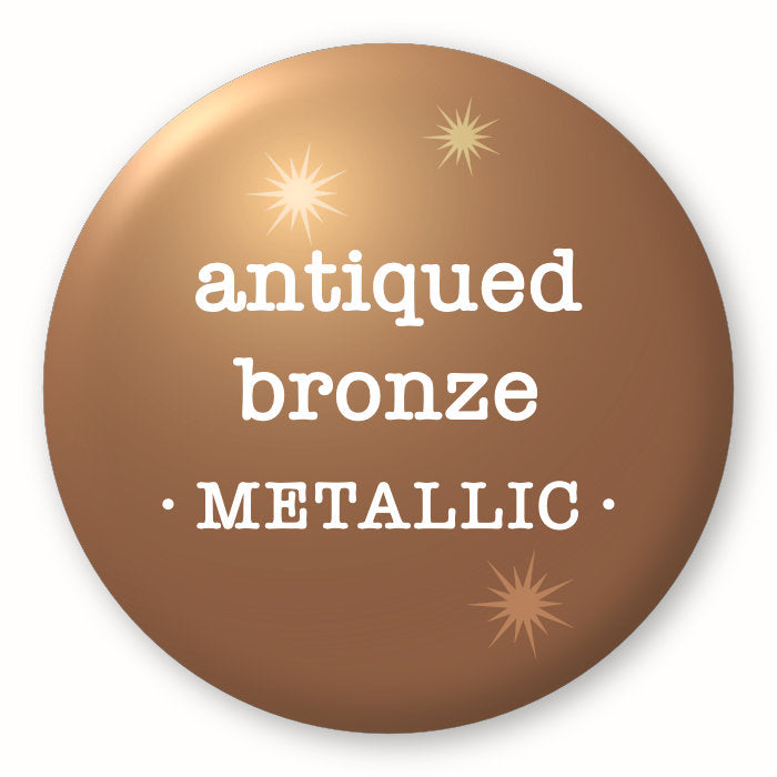 Antiqued Bronze, metallic - Tim Holtz Distress by Ranger - Image of a round spot with the colour name in the centre. To coincide with your choice of colour when purchasing Distress Paint, Spray Stain, Oxide Spray, Ink Pad, Oxide Ink Pad, Reinker, Oxide Reinker, Embossing Glaze, or Archival Reinker from Art by Jenny Online Shop in Australia. Please note, while we have taken care to show a close representation, the colour may vary between screens or different mediums (inks, oxides, etc).