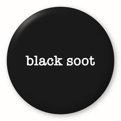 Black Soot - Tim Holtz Distress by Ranger - Image of a round spot with the colour name in the centre. To coincide with your choice of colour when purchasing Distress Paint, Spray Stain, Oxide Spray, Ink Pad, Oxide Ink Pad, Reinker, Oxide Reinker, Embossing Glaze, or Archival Reinker from Art by Jenny Online Shop in Australia. Please note, while we have taken care to show a close representation, the colour may vary between screens or different mediums (inks, oxides, etc).