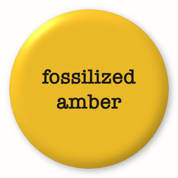 Fossilized Amber - Tim Holtz Distress by Ranger - Image of a round spot with the colour name in the centre. To coincide with your choice of colour when purchasing Distress Paint, Spray Stain, Oxide Spray, Ink Pad, Oxide Ink Pad, Reinker, Oxide Reinker, Embossing Glaze, or Archival Reinker from Art by Jenny Online Shop in Australia. Please note, while we have taken care to show a close representation, the colour may vary between screens or different mediums (inks, oxides, etc).