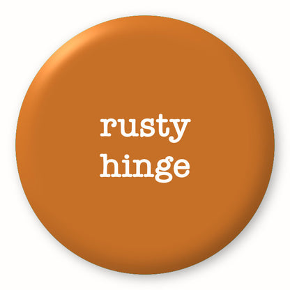 Rusty Hinge - Tim Holtz Distress by Ranger - Image of a round spot with the colour name in the centre. To coincide with your choice of colour when purchasing Distress Paint, Spray Stain, Oxide Spray, Ink Pad, Oxide Ink Pad, Reinker, Oxide Reinker, Embossing Glaze, or Archival Reinker from Art by Jenny Online Shop in Australia. Please note, while we have taken care to show a close representation, the colour may vary between screens or different mediums (inks, oxides, etc).