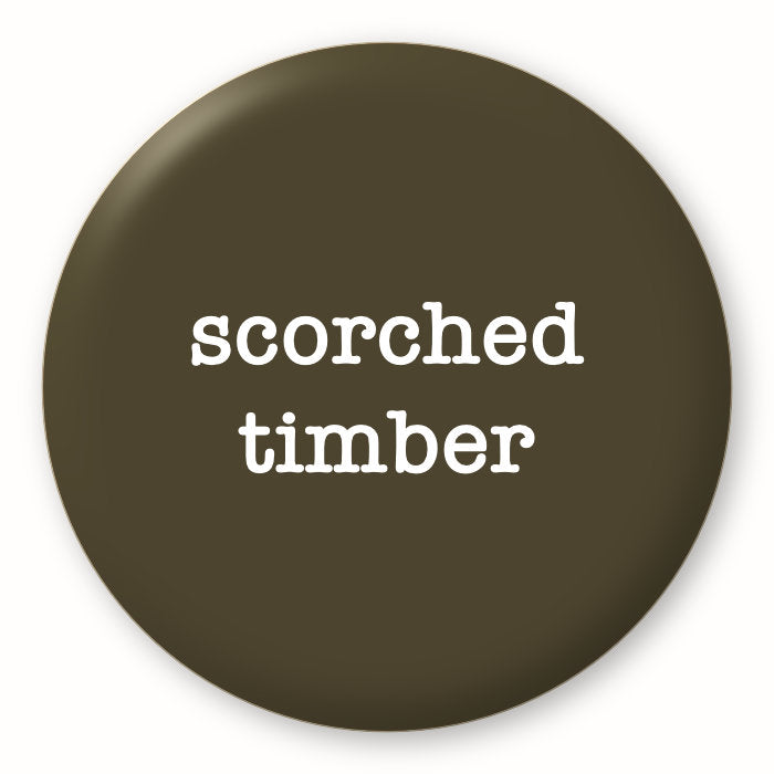 Scorched Timber - Tim Holtz Distress by Ranger - Image of a round spot with the colour name in the centre. To coincide with your choice of colour when purchasing Distress Paint, Spray Stain, Oxide Spray, Ink Pad, Oxide Ink Pad, Reinker, Oxide Reinker, Embossing Glaze, or Archival Reinker from Art by Jenny Online Shop in Australia. Please note, while we have taken care to show a close representation, the colour may vary between screens or different mediums (inks, oxides, etc).