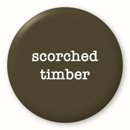 Scorched Timber - Tim Holtz Distress by Ranger - Image of a round spot with the colour name in the centre. To coincide with your choice of colour when purchasing Distress Paint, Spray Stain, Oxide Spray, Ink Pad, Oxide Ink Pad, Reinker, Oxide Reinker, Embossing Glaze, or Archival Reinker from Art by Jenny Online Shop in Australia. Please note, while we have taken care to show a close representation, the colour may vary between screens or different mediums (inks, oxides, etc).