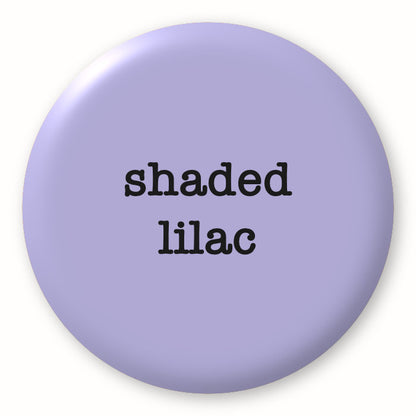 Shaded Lilac - Tim Holtz Distress by Ranger - Image of a round spot with the colour name in the centre. To coincide with your choice of colour when purchasing Distress Paint, Spray Stain, Oxide Spray, Ink Pad, Oxide Ink Pad, Reinker, Oxide Reinker, Embossing Glaze, or Archival Reinker from Art by Jenny Online Shop in Australia. Please note, while we have taken care to show a close representation, the colour may vary between screens or different mediums (inks, oxides, etc).