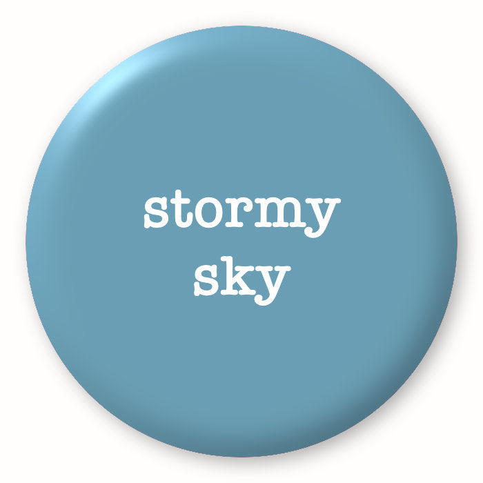 Stormy Sky, blue - Tim Holtz Distress by Ranger - Image of a round spot with the colour name in the centre. To coincide with your choice of colour when purchasing Distress Paint, Spray Stain, Oxide Spray, Ink Pad, Oxide Ink Pad, Reinker, Oxide Reinker, Embossing Glaze, or Archival Reinker from Art by Jenny Online Shop in Australia. Please note, while we have taken care to show a close representation, the colour may vary between screens or different mediums (inks, oxides, etc).