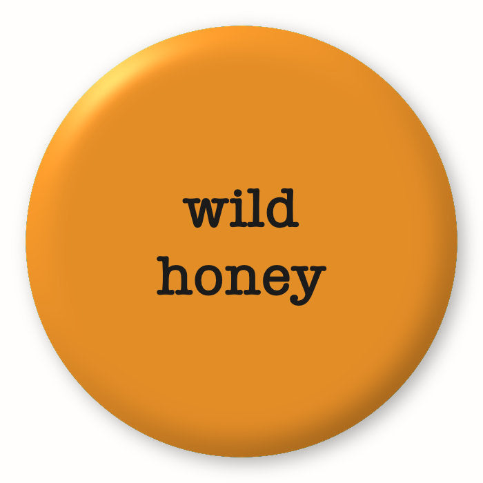 Wild Honey - Tim Holtz Distress by Ranger - Image of a round spot with the colour name in the centre. To coincide with your choice of colour when purchasing Distress Paint, Spray Stain, Oxide Spray, Ink Pad, Oxide Ink Pad, Reinker, Oxide Reinker, Embossing Glaze, or Archival Reinker from Art by Jenny Online Shop in Australia. Please note, while we have taken care to show a close representation, the colour may vary between screens or different mediums (inks, oxides, etc).