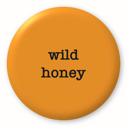 Wild Honey - Tim Holtz Distress by Ranger - Image of a round spot with the colour name in the centre. To coincide with your choice of colour when purchasing Distress Paint, Spray Stain, Oxide Spray, Ink Pad, Oxide Ink Pad, Reinker, Oxide Reinker, Embossing Glaze, or Archival Reinker from Art by Jenny Online Shop in Australia. Please note, while we have taken care to show a close representation, the colour may vary between screens or different mediums (inks, oxides, etc).