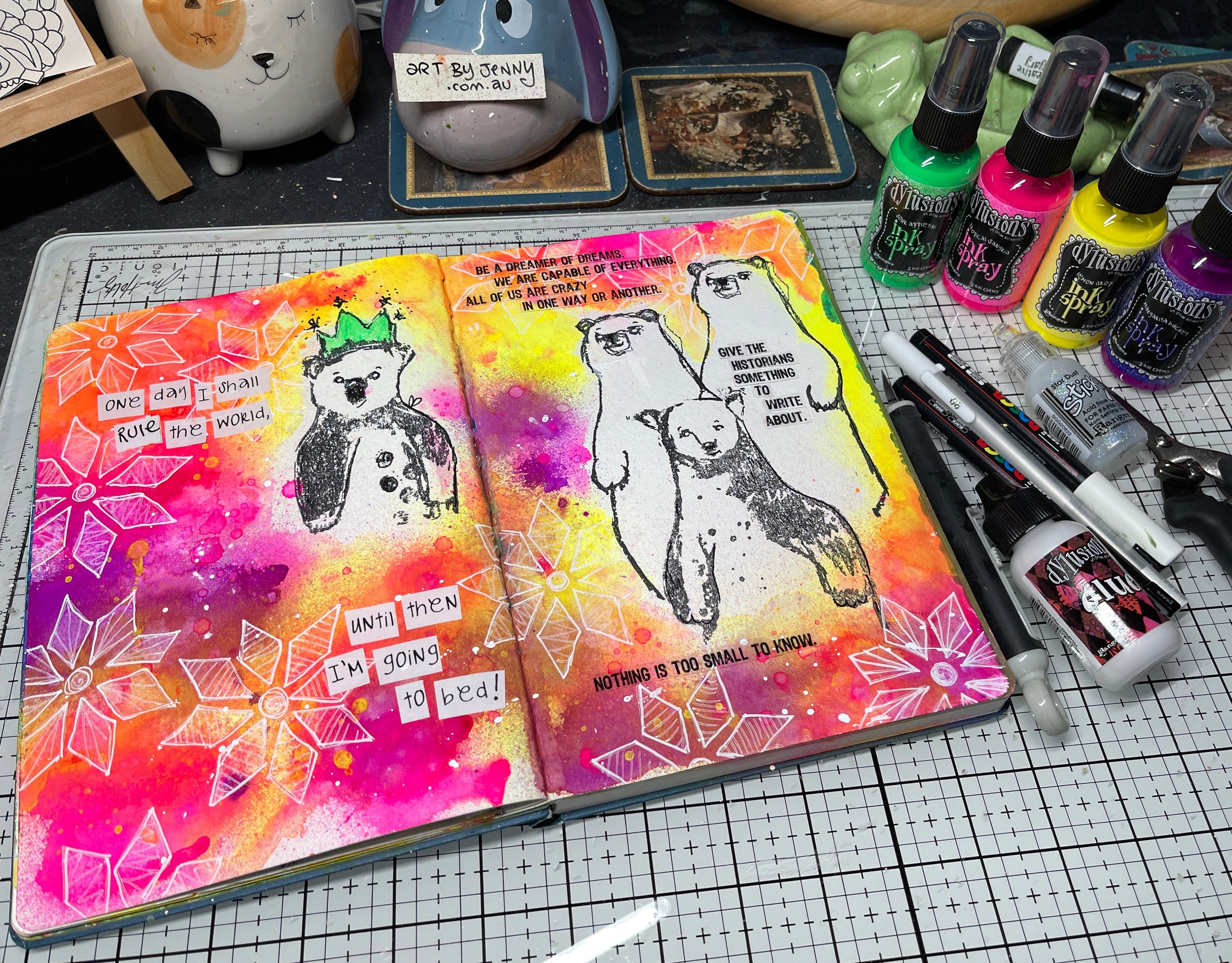 Art journal page created by Jenny James, using Dina Wakley MEdia Stamps Regal Bears, Dylusions Ink Sprays in Margarita Bucket, Tropical Sangria, Lemon Drop, around the stamped images. Doodled starry shapes in white pen around the bears. Wisdom from Dylusions Back Chat.