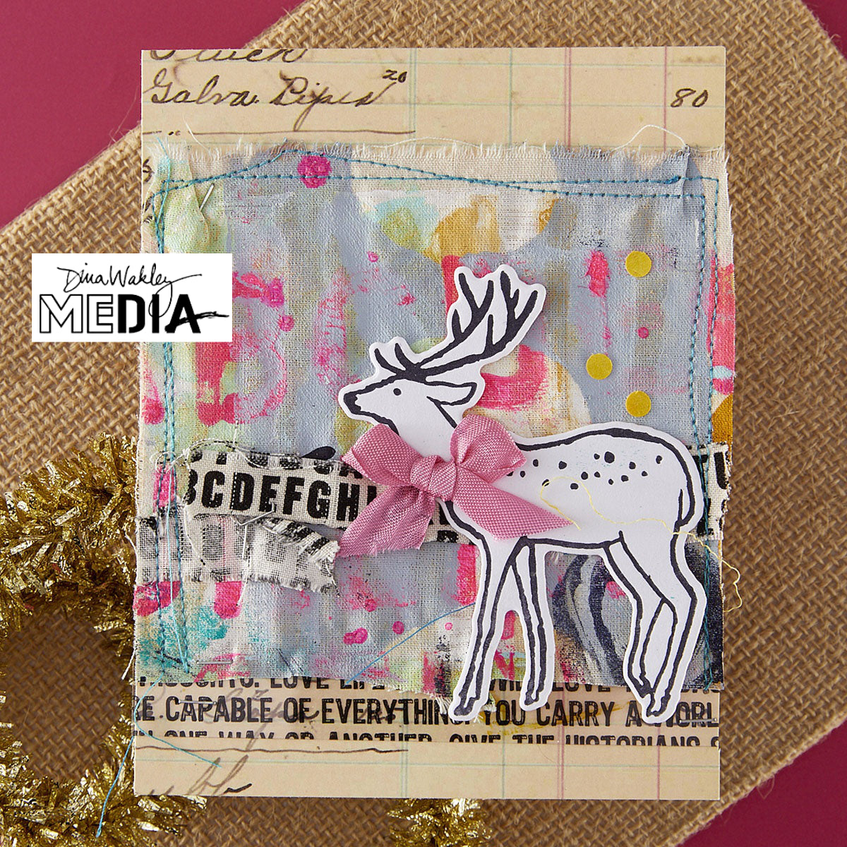 Wonderful Christmas Card made by Dina Wakley using Spellbinder Paper Arts BetterPress Plates and Embossing Folder . Use the designs in mixed media, cardmaking, journaling, scrapbooking and visual arts. Dina's Spellbinders sets include festive designs of birds, baubles, heartfelt messages, holly and berries, spots, crescent moon, reindeer, foliage and stars. All the DWM metal embossing and printing plates can to be used together or separately to create dimension with or without ink. Enjoy!