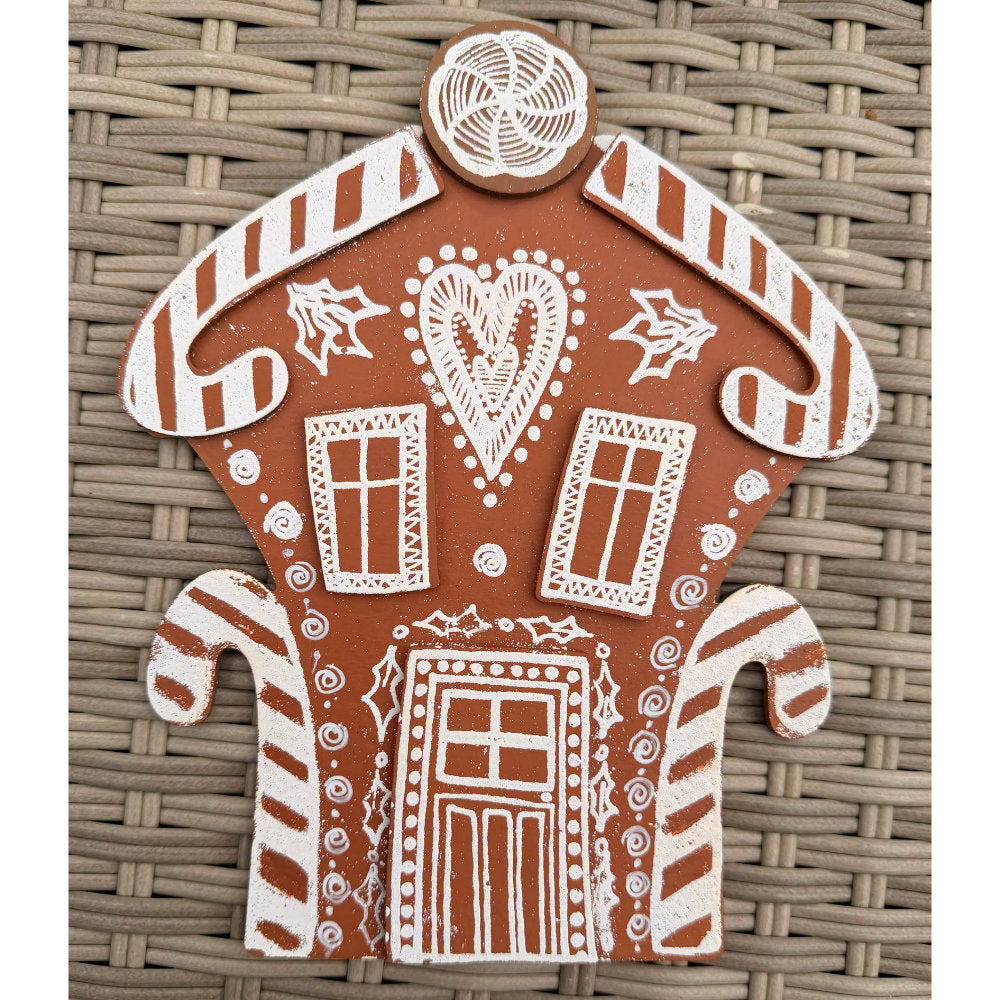 Dyan Reaveley's Dylusions Stampers Anonymous arty crafty example made by Dyan - a gingerbread house made with a Village Cutout Artboard kit using Dylusions red rubber art stamps, white fine embossing powder and a little heat to melt the powder to create a glazed faux enamel finish.