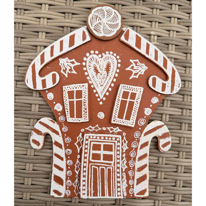 Dyan Reaveley's Dylusions Stampers Anonymous arty crafty example made by Dyan - a gingerbread house made with a Village Cutout Artboard kit using Dylusions red rubber art stamps, white fine embossing powder and a little heat to melt the powder to create a glazed faux enamel finish.