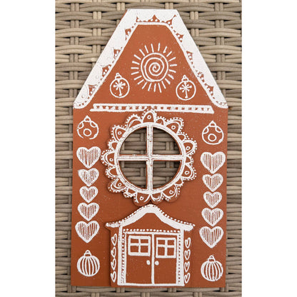 Dyan Reaveley's Dylusions Stampers Anonymous arty crafty example made by Dyan - a gingerbread house made with a Village Cutout Artboard kit using Dylusions red rubber art stamps, white fine embossing powder and a little heat to melt the powder to create a glazed faux enamel finish.