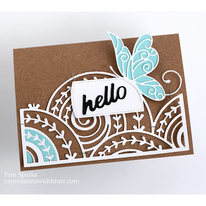 Curlicue Plate - Die Cutting Template by Memory Box (no. MB94698). Spirals and arrows curling and overlapping. Design size 4" x 5 1/4" (10.2cm x 13.3cm). 1 (one) template.  This gorgeous design features overlapping spirals of curls and arrows in fine lines, perfect for layering and adding dimension for cards, scrapbook pages, journaling, mixed media of all kinds. Photo of a card by Pam Sparks, featuring part of the design with a butterfly on kraft.