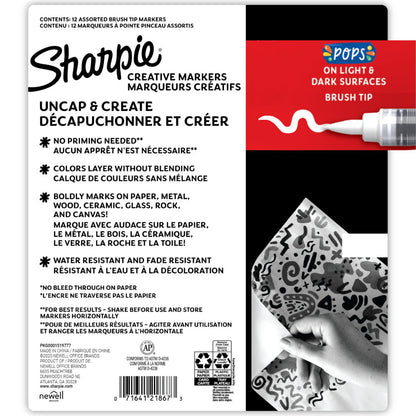 Sharpie Creative Markers - Brush Tip. 12 (twelve) paint pens, assorted colours (one of each). Line width is varied from very fine to wide, approx 1mm to 2.5mm wide, depending on pressure applied. Waterbased creative paint pens which do not need priming and work on all surfaces, drying to a permanent, water resistant, fade resistant finish. Does not bleed through paper and works on both light and dark surfaces.