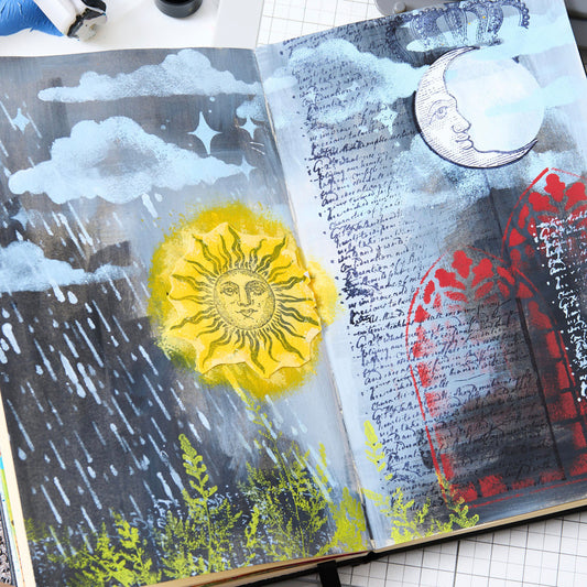 sample using Weather Wonder - Stencils and Stamps ... Sizzix Studio Mixed Media Kit ... by Mark Montano and Sizzix. Layering art stencils and clear acrylic stamps to use for mixed media, papercrafts, art journaling, visual arts of all kinds. Pack has 6 (six) stamp designs and 3 (three) stencils, 6 3/4" x 10" in size. Stamp designs include a vintage handwritten letter in inky writing, 2 regal crowns, frond of pine tree (leafy branch), crescent moon, smiling sun. Stencils are of stars, windows, clouds, rain, 