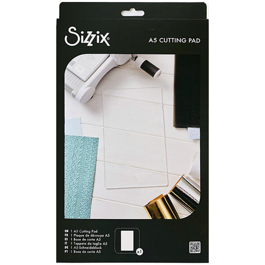 Clear Cutting Pad, A5 ... by Sizzix. An extended size of A5, this is a clear plastic cutting plate to use with Sizzix steel-rule dies, wafer-thin dies and the large A5 embossing folders. Size of the rectangle cutting plate is 10 1/4" x 6 1/8" (260mm x 155mm). This Sizzix Cutting Pad is named "A5" however is longer than A5 at 26cm long. It has been designed to be used with the larger embossing folders as well as all the small to medium sized templates and folders. Product no.666919. Image of packaging.