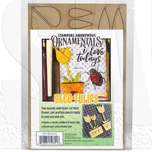 Stampers Anonymous 'Decor-Tulips' laser-cut decoupage kit in its original clear plastic packaging, showing the kraft paper boards and printed insert card.