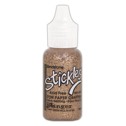 Sandstone - Stickles by Ranger . Add a touch of magical sparkle everywhere you go with this beautiful and easy to use glitter glue! Stickles is a clear medium infused with an abundance of non-settling super fine sparkly glitters in a wild variety of colours. Use on papercrafts, scrapbooking, mixed media, cardmaking, visual arts of all kinds. Each bottle holds 18ml and has a fine tipped nozzle with an easy squeeze application. Once dry on porous surfaces, it is permanent and does not brush off.