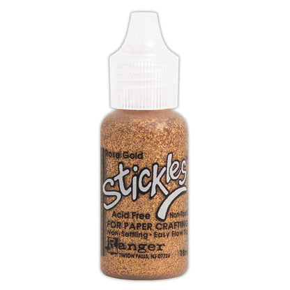 Rose Gold - Stickles by Ranger . Add a touch of magical sparkle everywhere you go with this beautiful and easy to use glitter glue! Stickles is a clear medium infused with an abundance of non-settling super fine sparkly glitters in a wild variety of colours. Use on papercrafts, scrapbooking, mixed media, cardmaking, visual arts of all kinds. Each bottle holds 18ml and has a fine tipped nozzle with an easy squeeze application. Once dry on porous surfaces, it is permanent and does not brush off.