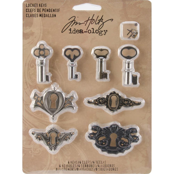 Locket Keys, Metal Adornments ... by Tim Holtz Idea-Ology - Vintage inspired metal keyhole plates with complimenting keys, each in a different style. Use for mixed media, assemblage projects, cardmaking, junk journaling, book making, visual arts. 4 (four) keyhole plates, 4 (four) locket keys, 8 (eight) split-pin (brad) fasteners, 1 (one) of each design. TH92822. Photo of the packet.