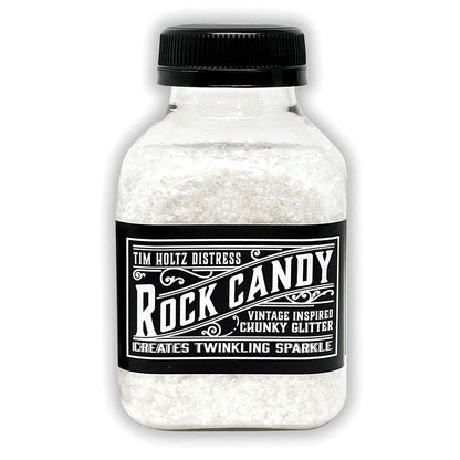 Chunky - Rock Candy Distress Dry Glitter - by Tim Holtz and Ranger ... A crystal clear, light sparkly multi-sized large chunky glitter. Jar contains 4.7oz (133g) jar.

Tim's 'Chunky' Distress Dry Glitter is a vintage inspired, multi-sized large translucent glitter which creates twinkling chunky sugary sparkle everywhere you go. TDR92681