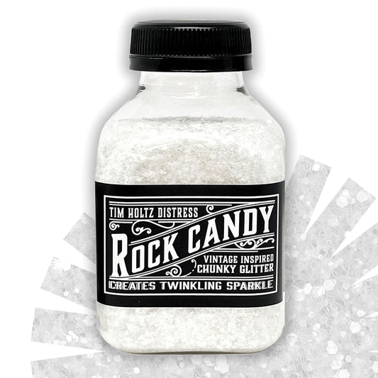 Chunky - Rock Candy Distress Dry Glitter - by Tim Holtz and Ranger ... A crystal clear, light sparkly multi-sized large chunky glitter. Jar contains 4.7oz (133g) jar.

Tim's 'Chunky' Distress Dry Glitter is a vintage inspired, multi-sized large translucent glitter which creates twinkling chunky sugary sparkle everywhere you go. TDR92681