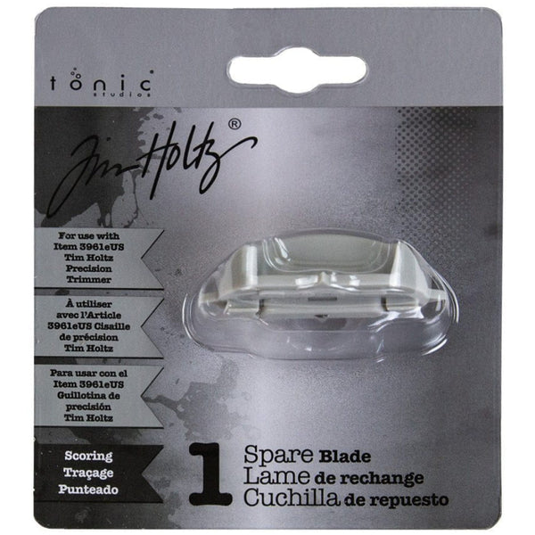 Spare Scoring Blades (fine marking blades) - for the Precision Trimmer - by Tim Holtz and Tonic Studios ... Experience the unmatched quality of Tim Holtz® Tools made by Tonic Studios. Tonic Precision Trimmer is sold separately! Pack contains 1 (one) blade used for scoring or marking straight lines without cutting.
