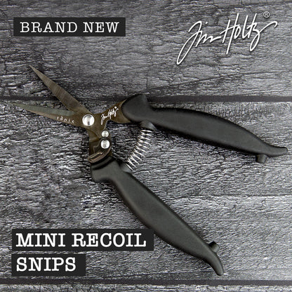Recoil Snips, 7" Scissors - by Tim Holtz and Tonic Studios ... Titanium-coated, double-bevelled smooth sharp blades with customisable spring tension to provide a smooth precise cutting experience for both left and right handed crafters. A fusion of ingenuity plus innovation, Tim Holtz Recoil Scissors have features specifically designed for the maker (creators, crafters, artists). Image of an open pair of Tim Holtz Tonic Studios Recoil Snips (7" scissors).