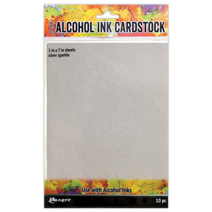 Silver Sparkle Cardstock - by Tim Holtz and Ranger ... a cool silver coloured cardstock with a subtle shine and sparkly effect with a smooth finish. Ideal as a base for alcohol ink painting or marbling, using for embossing, cardmaking, die cutting, mixed media and creative papercrafts. 10 (ten) sheets, 5" x 7" (127mm x 177mm) in size.

Tim Holtz Silver Sparkle Alcohol Ink Sheets are rectangle pieces of shimmering silver coated cardstock to use with Tim Holtz and Ranger alcohol inks and Distress mediums.