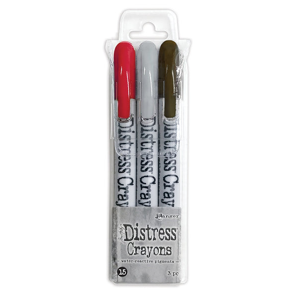Distress Crayons - Set 15 ... by Tim Holtz. 3 (three) colours (Lumberjack Plaid, Scorched Timber, Lost Shadow) of aquarelle pastels, watersoluble crayons in a twist-style barrel / holder with lid. One of each colour in a clear wallet for handy storage. 
