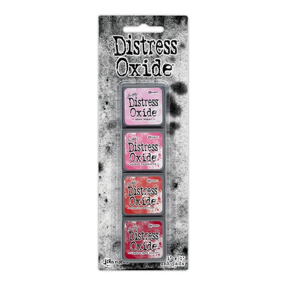 Mini Distress Oxide Ink Pads - Set 1 - by Tim Holtz and Ranger ... featuring water-reactive dye and pigment ink fusion that creates an oxidised effect when spattered, stamped, brushed and or sprayed with water. The colours are opaque and dry with a soft matte finish. Set of 4 (four) colours, one of each (TDIK91479). 
Colours in this set are ...
- Spun Sugar
- Picked Raspberry
- Festive Berries
- Lumberjack Plaid
... one of each colour.