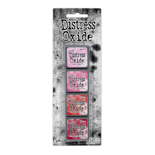 Mini Distress Oxide Ink Pads - Set 1 - by Tim Holtz and Ranger ... featuring water-reactive dye and pigment ink fusion that creates an oxidised effect when spattered, stamped, brushed and or sprayed with water. The colours are opaque and dry with a soft matte finish. Set of 4 (four) colours, one of each (TDIK91479). 
Colours in this set are ...
- Spun Sugar
- Picked Raspberry
- Festive Berries
- Lumberjack Plaid
... one of each colour.