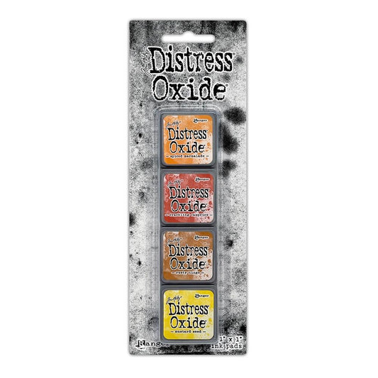 Mini Distress Oxide Ink Pads - Set 2 - by Tim Holtz and Ranger ... featuring water-reactive dye and pigment ink fusion that creates an oxidised effect when spattered, stamped, brushed and or sprayed with water. The colours are opaque and dry with a soft matte finish. Set of 4 (four) colours, one of each (TDIK91486). 
Colours in this set are ...
- Spiced Marmalade
- Crackling Campfire
- Rusty Hinge
- Mustard Seed
... one of each colour.