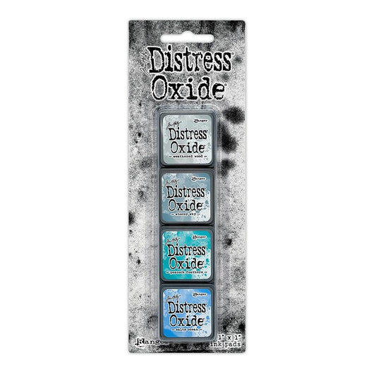 Mini Distress Oxide Ink Pads - Set 4 - by Tim Holtz and Ranger ... featuring water-reactive dye and pigment ink fusion that creates an oxidised effect when spattered, stamped, brushed and or sprayed with water. The colours are opaque and dry with a soft matte finish. Set of 4 (four) colours, one of each (TDIK91509).

Colours in this set are ...
- Weathered Wood
- Stormy Sky
- Peacock Feathers
- Salty Ocean
... one of each colour.