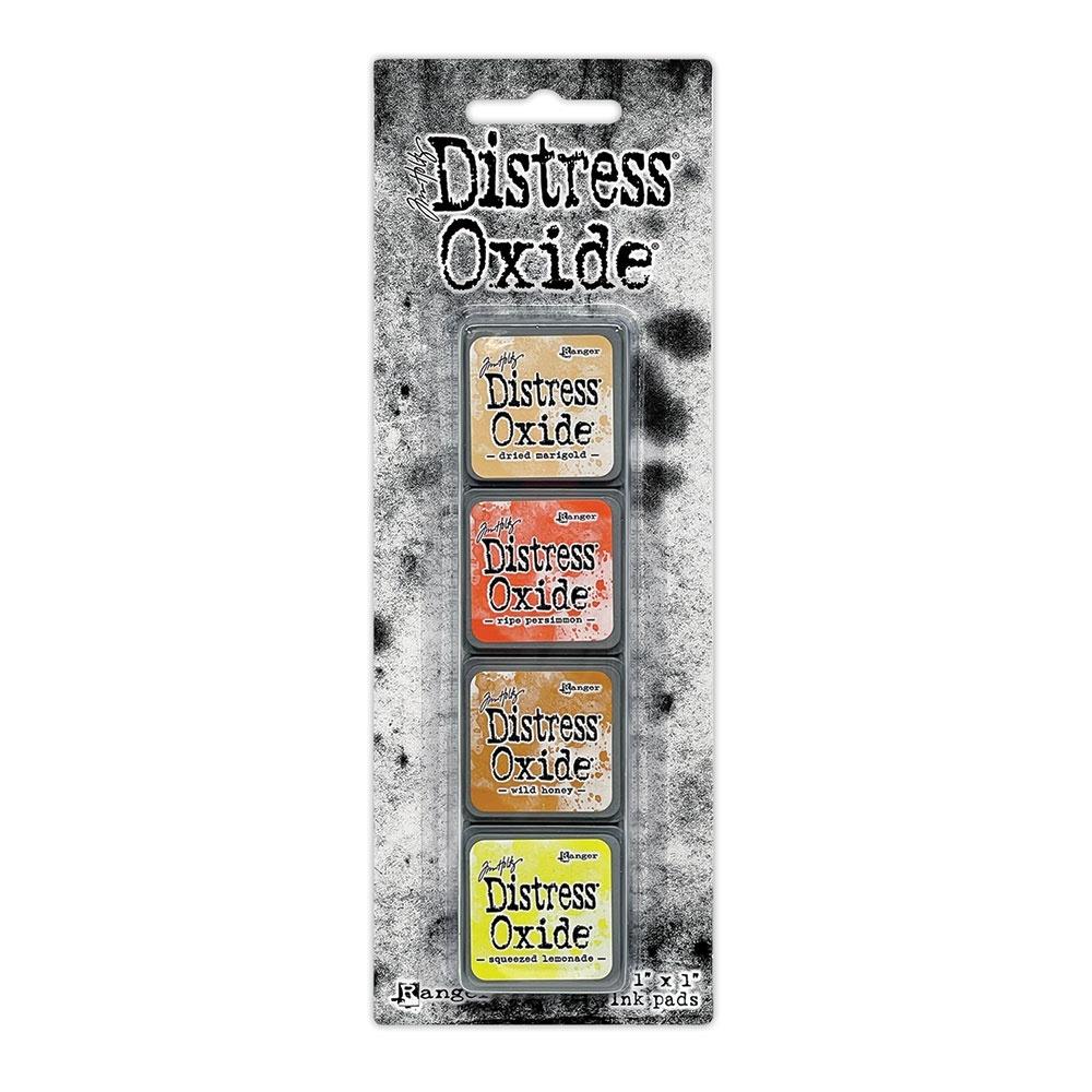 Mini Distress Oxide Ink Pads - Set 8 - by Tim Holtz and Ranger ... featuring water-reactive dye and pigment ink fusion that creates an oxidised effect when spattered, stamped, brushed and or sprayed with water. The colours are opaque and dry with a soft matte finish. Set of 4 (four) colours in Mini Ink Pad Cubes, one of each (TDIK91547).

Colours in this set are ...
- Dried Marigold
- Ripe Persimmon
- Wild Honey
- Squeezed Lemonade
... one of each colour.