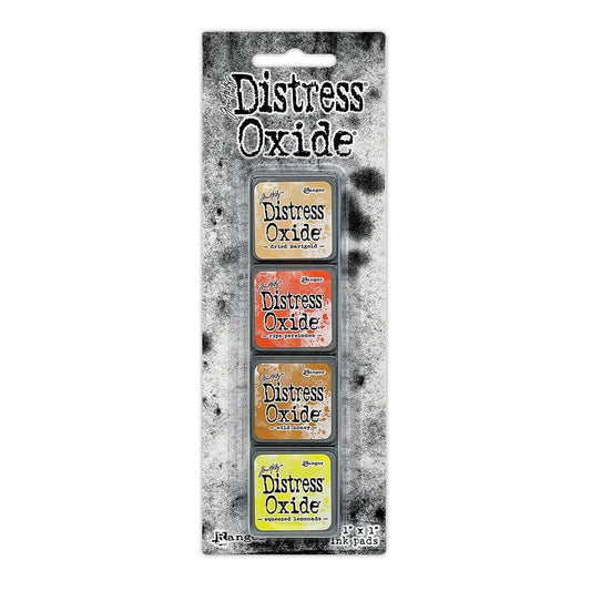 Mini Distress Oxide Ink Pads - Set 8 - by Tim Holtz and Ranger ... featuring water-reactive dye and pigment ink fusion that creates an oxidised effect when spattered, stamped, brushed and or sprayed with water. The colours are opaque and dry with a soft matte finish. Set of 4 (four) colours in Mini Ink Pad Cubes, one of each (TDIK91547).

Colours in this set are ...
- Dried Marigold
- Ripe Persimmon
- Wild Honey
- Squeezed Lemonade
... one of each colour.