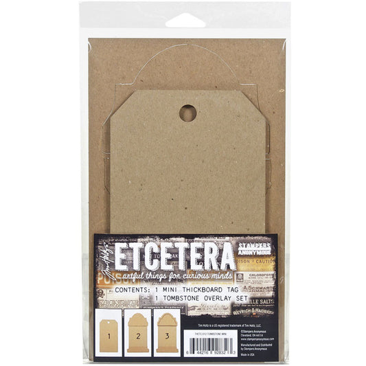 Tombstone Tag Set, Mini - Etcetera Thickboards ... by Tim Holtz and Stampers Anonymous. 1 (one) tag 4.5" x 8" in size with a gravestone overlay kit of top, frame and base. Perfect for all kinds of Halloween makes including wallart, gift tags, displays, dioramas, home decor and visual arts. Tim Holtz Etcetera tags are artful things for curious minds! Tim Holtz Etcetera Thickboard is a kraft brown hardboard substrate, a 2-3mm thick wood-like material used for mixed media.  Cello Pack.