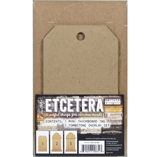 Tombstone Tag Set, Mini - Etcetera Thickboards ... by Tim Holtz and Stampers Anonymous. 1 (one) tag 4.5" x 8" in size with a gravestone overlay kit of top, frame and base. Perfect for all kinds of Halloween makes including wallart, gift tags, displays, dioramas, home decor and visual arts. Tim Holtz Etcetera tags are artful things for curious minds! Tim Holtz Etcetera Thickboard is a kraft brown hardboard substrate, a 2-3mm thick wood-like material used for mixed media. 