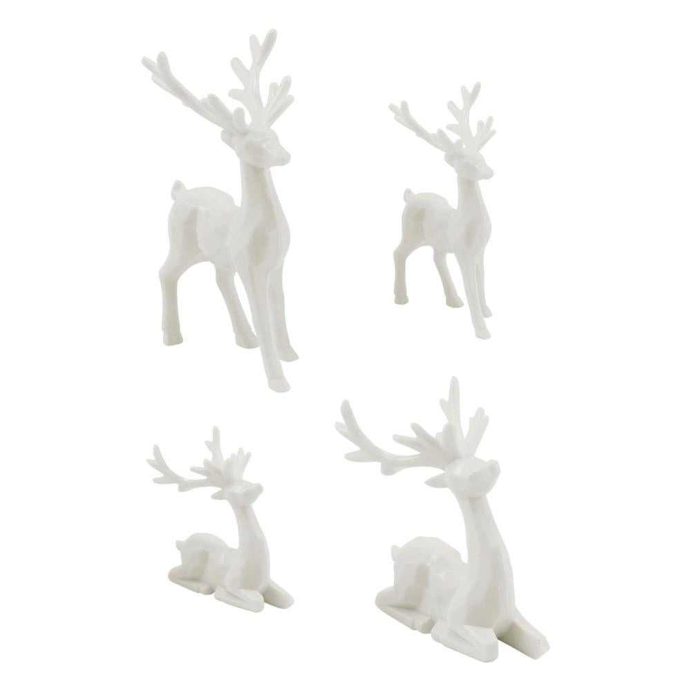 Salvaged Reindeer - Sitting and Standing Deer, Stags ... Idea-Ology Resin Models by Tim Holtz ... 4 miniature characters made of white resin. Two sitting deer, two standing deer, one of each style. Sizes from 1 1/4" to 3" high. Add wonderful animal friends to your seasonal makes with this family of 4 (four) reindeer. Each has intricately moulded details which are emphasised when altered with alcohol inks or solvent markers. TH94360