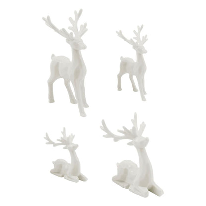Salvaged Reindeer - Sitting and Standing Deer, Stags ... Idea-Ology Resin Models by Tim Holtz ... 4 miniature characters made of white resin. Two sitting deer, two standing deer, one of each style. Sizes from 1 1/4" to 3" high. Add wonderful animal friends to your seasonal makes with this family of 4 (four) reindeer. Each has intricately moulded details which are emphasised when altered with alcohol inks or solvent markers. TH94360