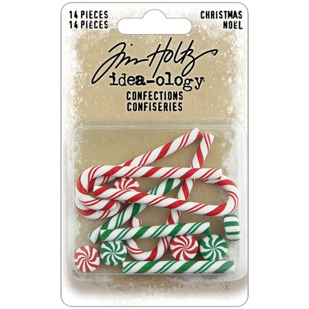 Christmas Confections - Candy Canes, Twirls and Sticks - by Tim Holtz Idea-Ology ... miniature resin sweeties used for decoration, assemblage or party decor. 14 (fourteen) pieces (4 canes, 4 sticks, 6 round twirls). TH94491
This packet contains a selection of faux sweets in the style and shape of traditional candycanes (red and white stripes), spearmint sticks (green and white stripes) and humbug twirls in red, white and green ... but they are not edible! Do not eat! Decoration only :)