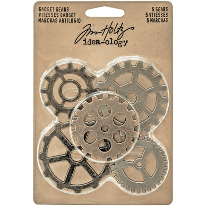 Gadget Gears ... Idea-Ology Adornments by Tim Holtz. Flat large metal cogs for use for mixed media, decorating books or displays, dioramas, off-the-page crafts, steampunk projects and creative visual arts. Pack of 5 (five) gears, one of each kind. Sizes (approx) : smallest two are 1 1/2" (38mm x 38mm), cog with round holes is 1 3/4" (43mm x 43mm), larger two cogs are 2" (50mm x 50mm) TH93297.