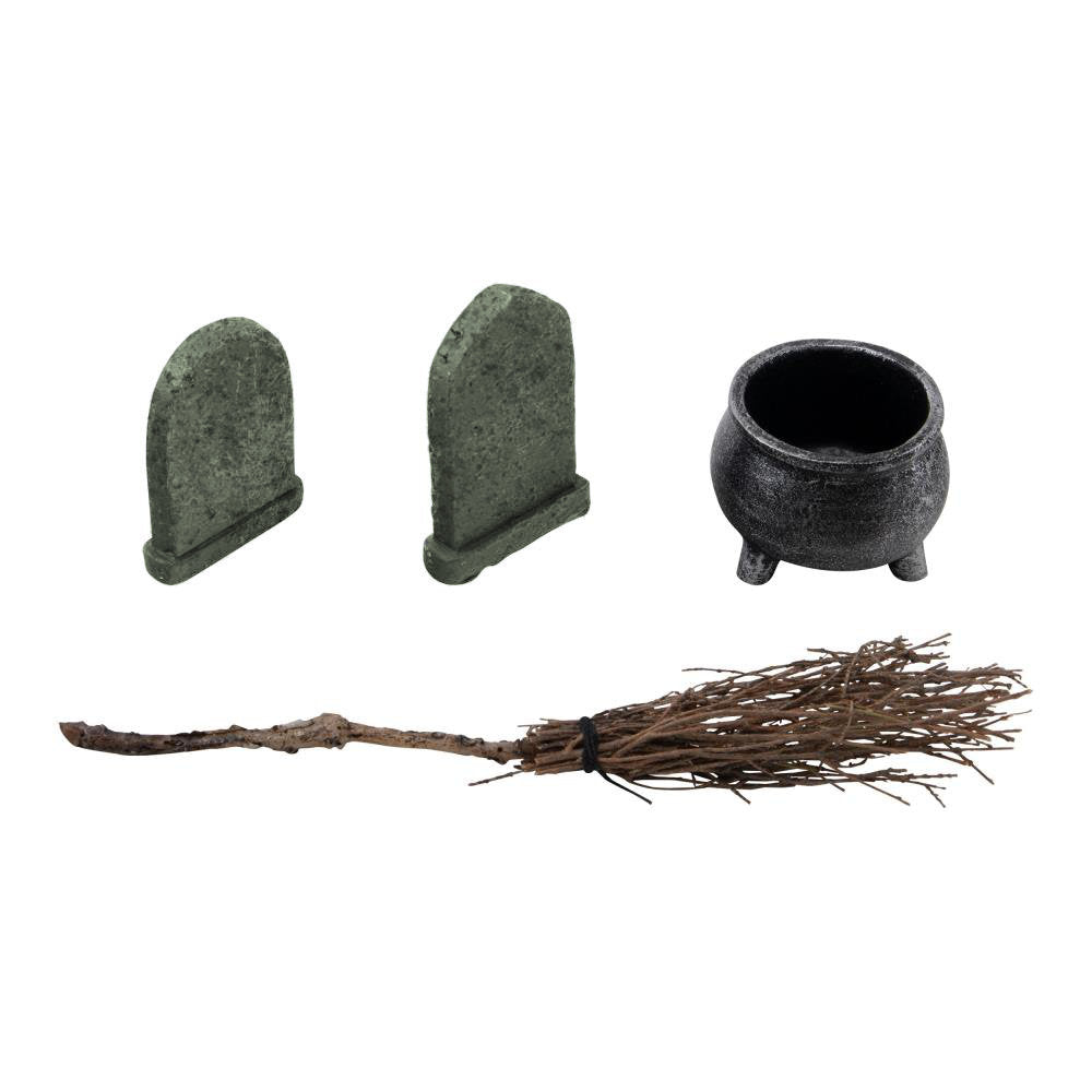 Graveyard - Cauldron, Broomstick and Headstones ... by Tim Holtz Idea-Ology - miniature models of Halloween essentials, moulded from durable resin and twigs. Use for mixed media, assemblage projects, off-the-page marvels and party decor. Pack of 4 (four) pieces, one of each. TH94337. Photo showing angled view.