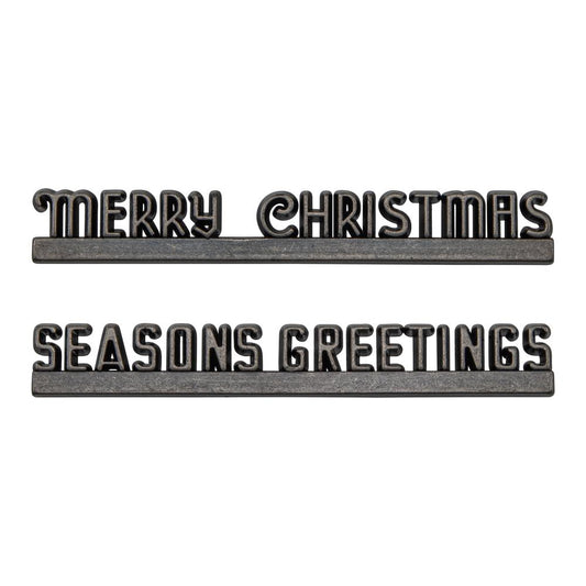 Christmas Marquee ... Idea-Ology Adornments by Tim Holtz. Beautifully detailed bright silver coloured metal typographical banners with flat bases to use as embellishments for Christmas display makes, dioramas, mixed media, paper crafts, cardmaking, junk journals, scrapbooking and visual arts. 2 (two) pieces, 4 1/2" wide. One of each phrase (Seasons Greetings, Merry Christmas).