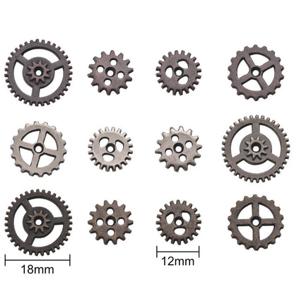 Mini Gears ... Idea-Ology Adornments by Tim Holtz. 12 (twelve) tiny cogs made of metal, used for mixed media, decorating ornaments, home decor makes, steampunk projects and visual arts.  This pack of high quality metal cogs and gears are finished in 3 (three) different antique colours - iron, copper, pewter. Ideal for all kinds of excuses to create - sculpture, mixed media, clocks, boxes and frames, adding to steampunk hats, making into interactive cards or frames, and much more.