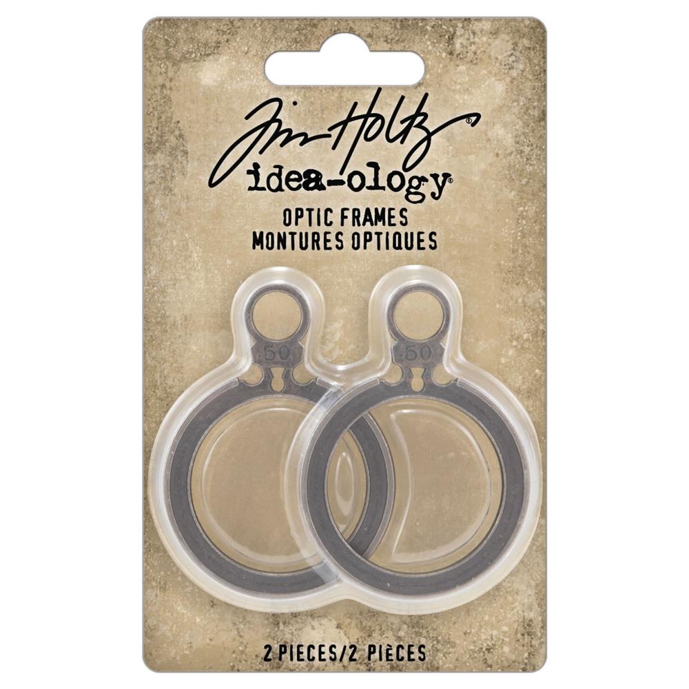 Optic Frames ... Idea-Ology Adornments by Tim Holtz. 2 (two) round open frames with tabs, each made of metal, used for mixed media, decorating ornaments, home decor makes and visual arts.&nbsp;  Tim Holtz Idea-Ology Metal Adornments are finished in an antique style pewter colour. Ideal for all kinds of excuses to create - visual arts, sculpture, mixed media canvas, decorating trays, clocks, boxes and frames. Use to display tiny works of art or layer onto mixed media. TH94375