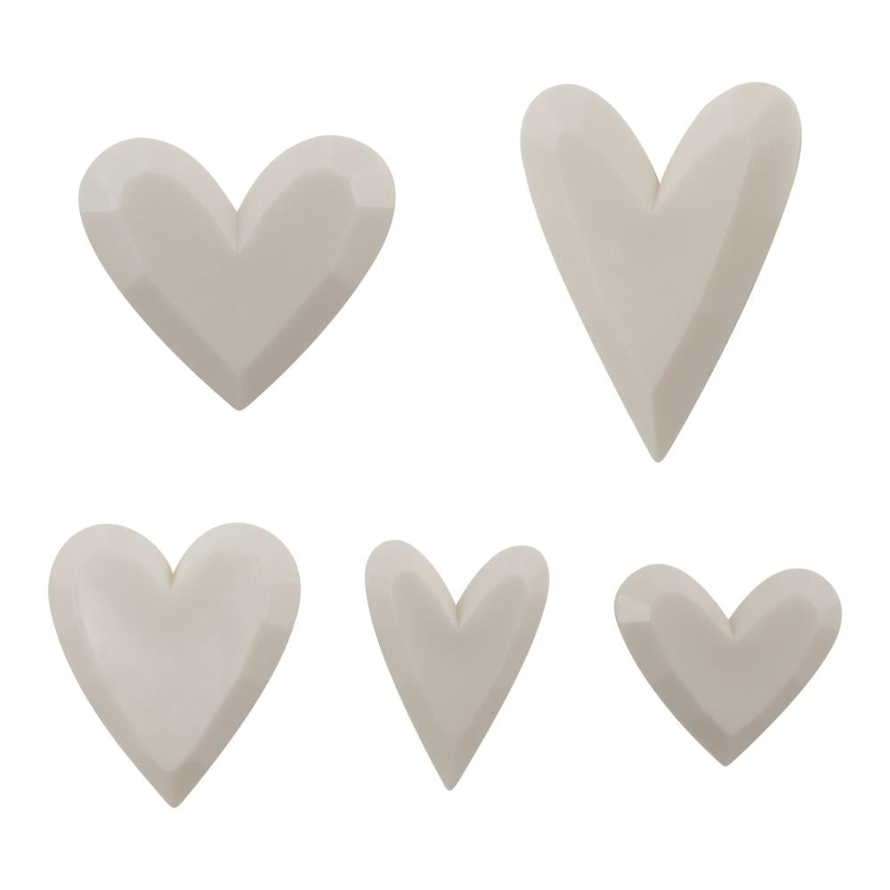 overview of Salvaged Hearts - Idea-Ology Resin Models by Tim Holtz ... 5 (five) dimensional faceted hearts made of creamy white resin, ready for altering and using in mixed media, home decor and visual arts.&nbsp;  Tim's Salvaged Hearts are fantastic to turn into flowers, use as flower centres, turn into bodies of mermaids, make faux chocolates, add to cards, frames or Vignette displays, altered with metallics using inks or leaf, use however you wish. TH94380